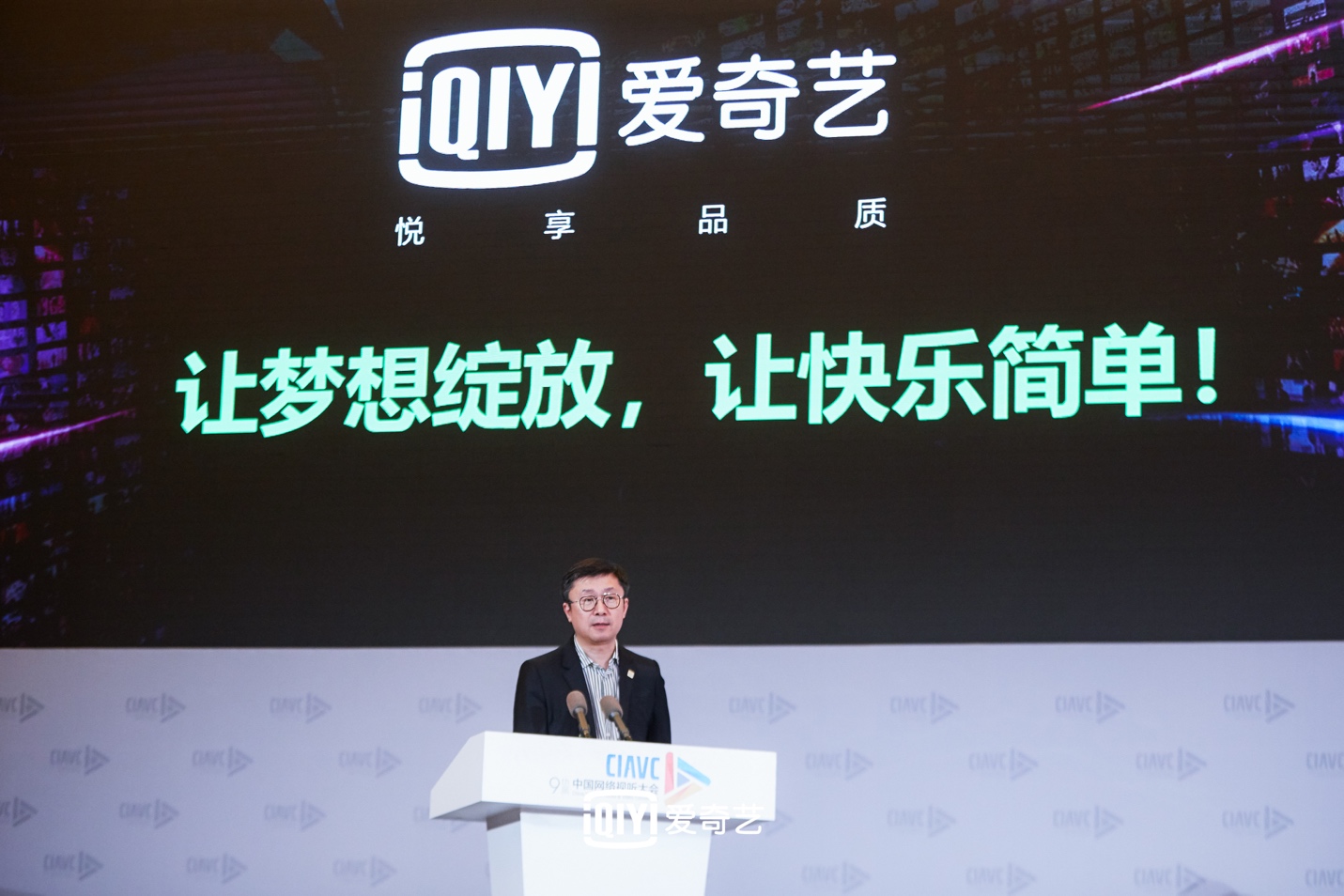 A person standing behind a podiumDescription automatically generated with low confidence